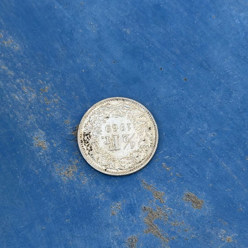 Swiss coin cut in 1969, used
