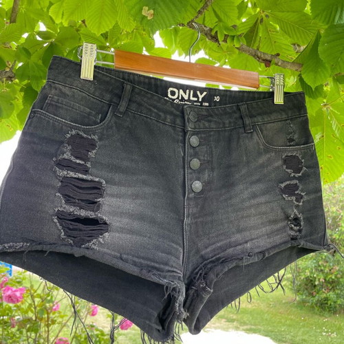 Only black denim shorts with rips like new, size 30