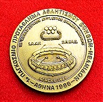  Μετάλλιο από το πρώτο παγκόσμιο πρωτάθλημα εφήβων-νεανίδων που έγινε το 1986 στην Αθήνα.