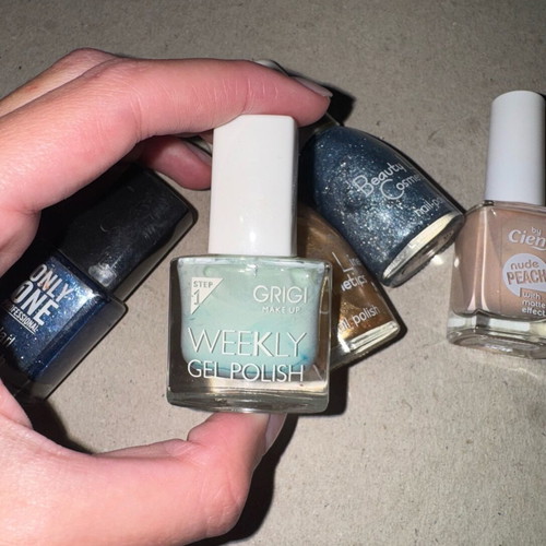 Nail polishes new, pack of 5 with blue, gold and nude shades