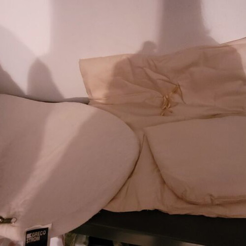 Baby bassinet used with wooden base and beige mattress