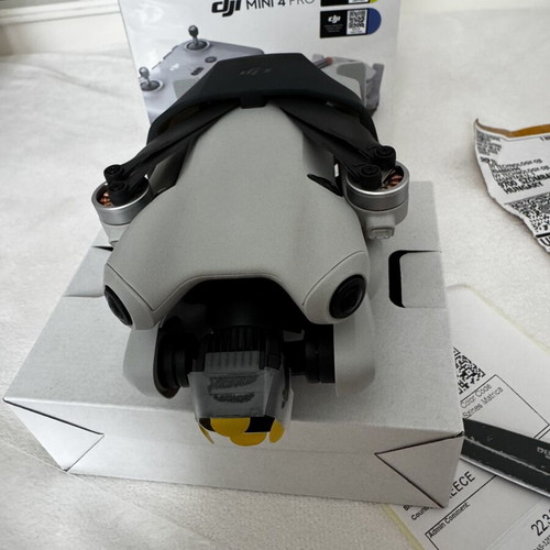 DJI Mini 4 Pro drone new with official DJI service and two batteries