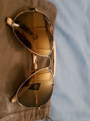 Polar sunglasses used, pilot style with leather details