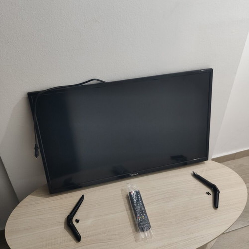 Tesla 32-inch TV with stand like new