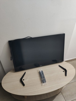Tesla 32-inch TV with stand like new