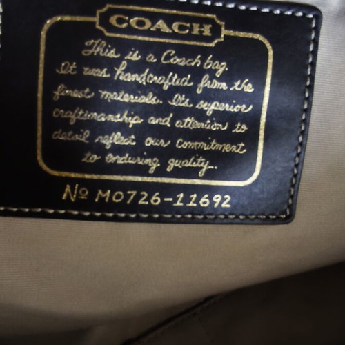 Coach Signature tan shoulder bag with leather details