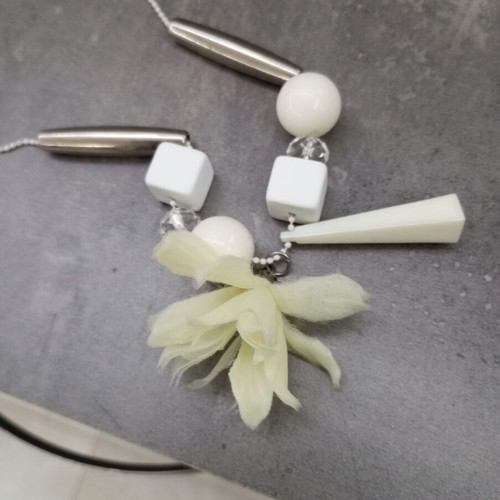 Necklace with white and silver beads and flower pendant
