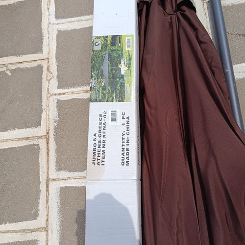 Garden umbrella with cast iron base like new, 2.50m diameter