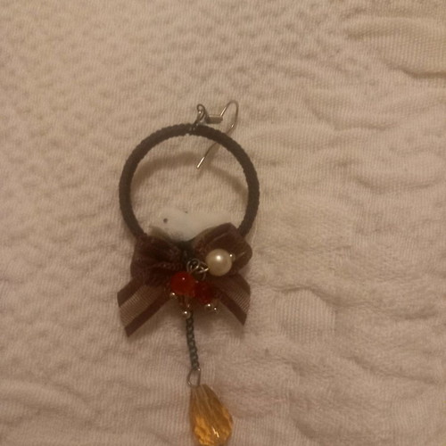 Pendant earring used, bird nest design