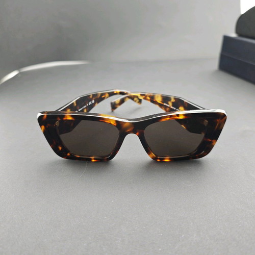Prada sunglasses used with original box and case