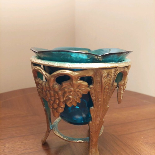 Vintage glass petrol planter with metal base like new