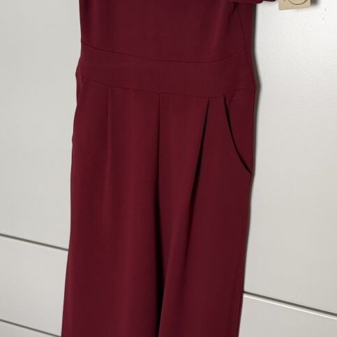 Burgundy jumpsuit with ruffles by Moda new, one size