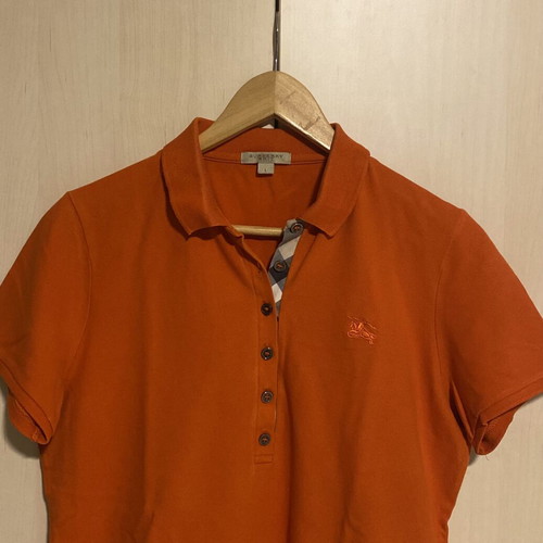 Burberry women's orange pique shirt like new