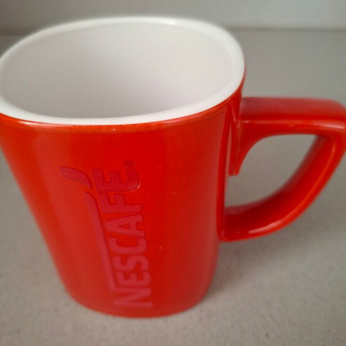 Nescafe mug used with red embossed letters, collectible