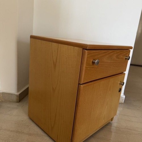 Wooden nightstand used with drawer and lockable cabinet
