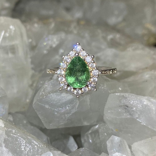 Silver ring with natural green tourmaline and moissanite