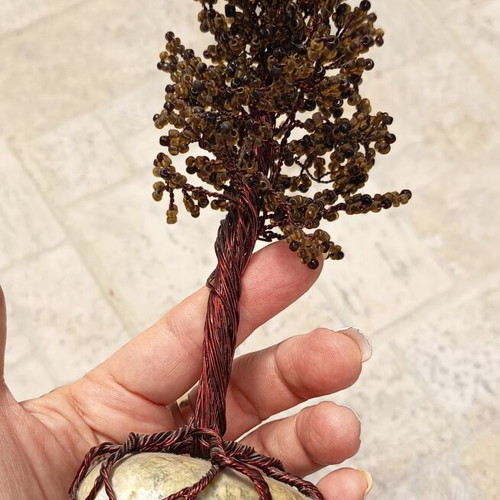 Handmade decorative tree with copper wire and beads on stone base