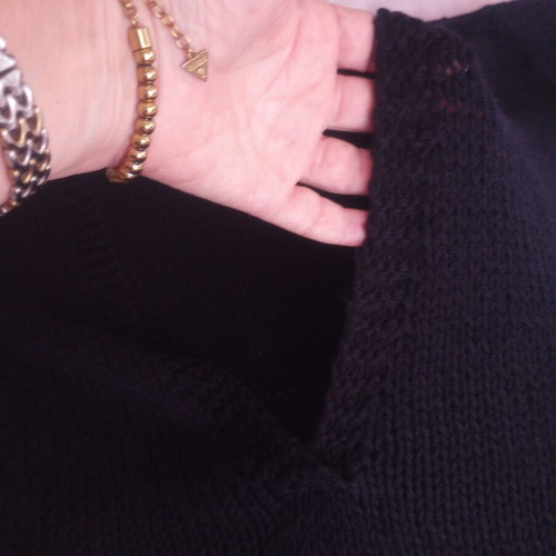 Handmade black knit top with open V back, used