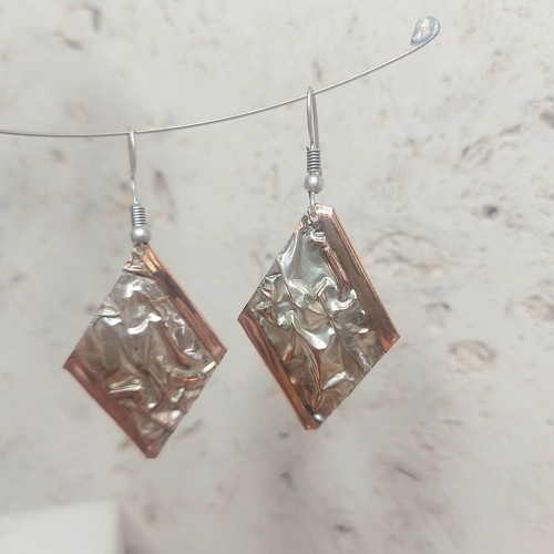 Silver plating dangling earrings like new, gold and silver colors