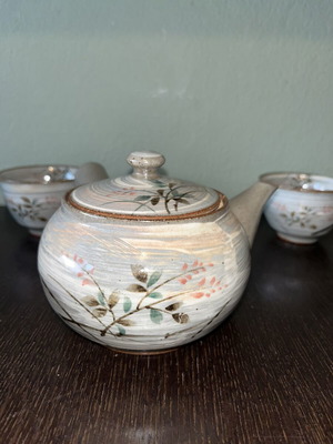 Japanese porcelain tea set with four cups in wooden box