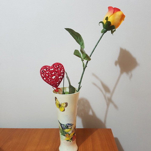 Small metal vase used
