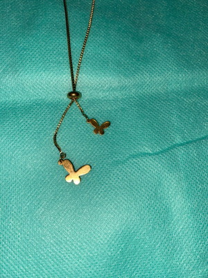 Women's long gold necklace like new, gold-colored
