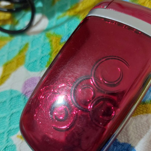 Alcatel vintage flip phone used, red, charger included