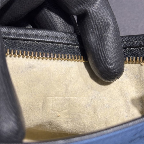 MCM Monogram Mini Toiletry Bag used, black with gold zipper