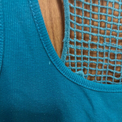 Blue sleeveless T-shirt used, size M/L with back design