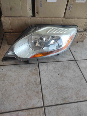 Hella front left headlight for Ford Kuga '08-'13 used