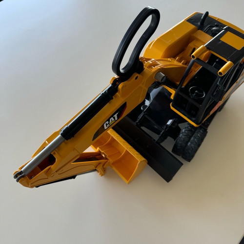 Bruder CAT Excavator used with wheels and shovel