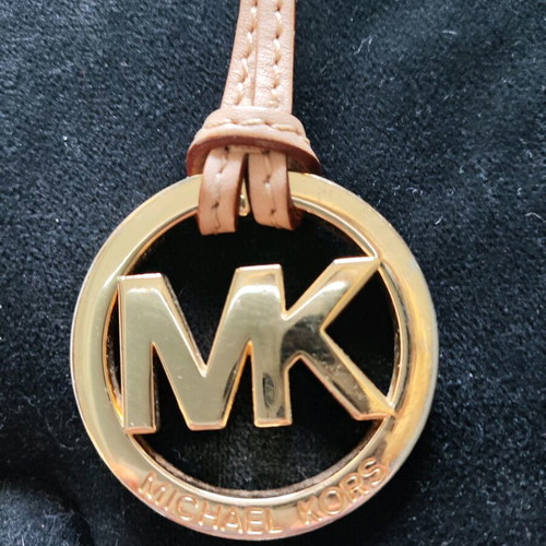Michael Kors Leather Logo Charm like new, beige and gold bag keychain