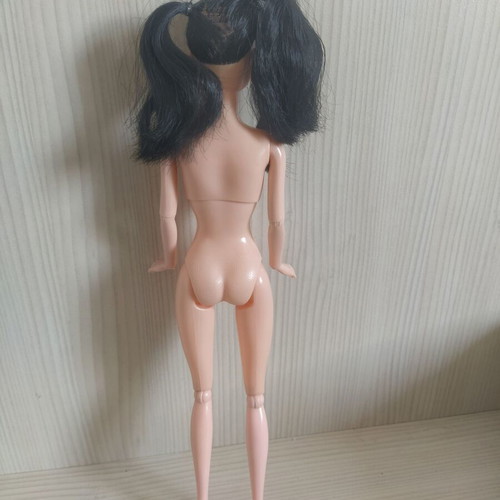 Barbie doll Asian with facesculpt Olivia and articulated body