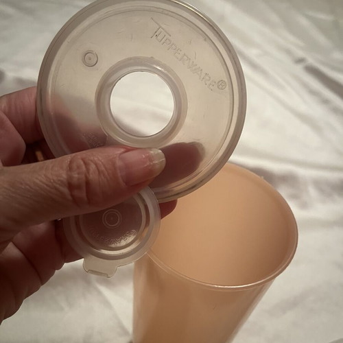 Tupperware shaker new, salmon color with double opening lid
