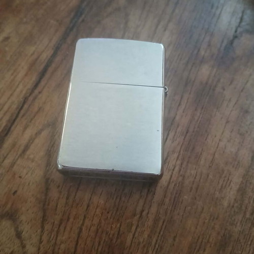 Zippo windproof lighter used with silver metal finish