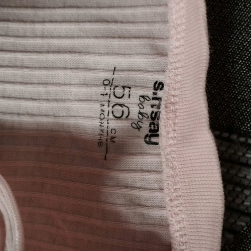 Full-body baby romper used in very good condition
