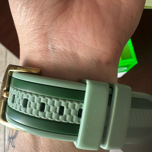 Breeze wristwatch used, green and gold unisex