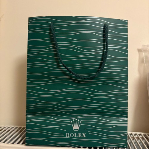Rolex paper bag like new without defect