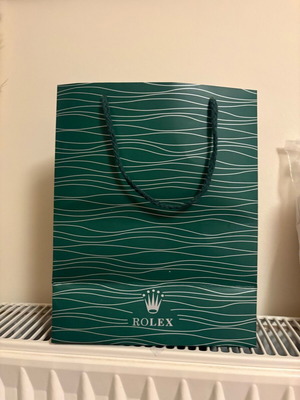 Rolex paper bag like new without defect