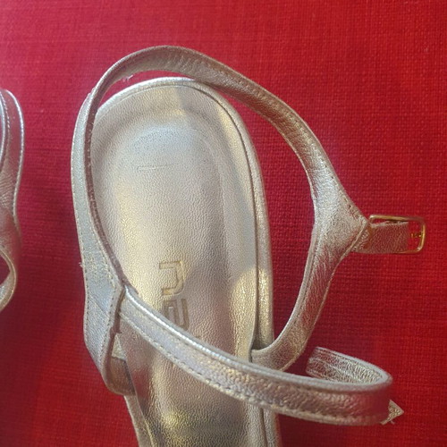 Nak gold sandals with low heel, used condition