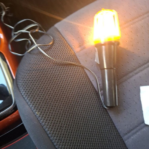 Car flashlight like new with long cable and hook