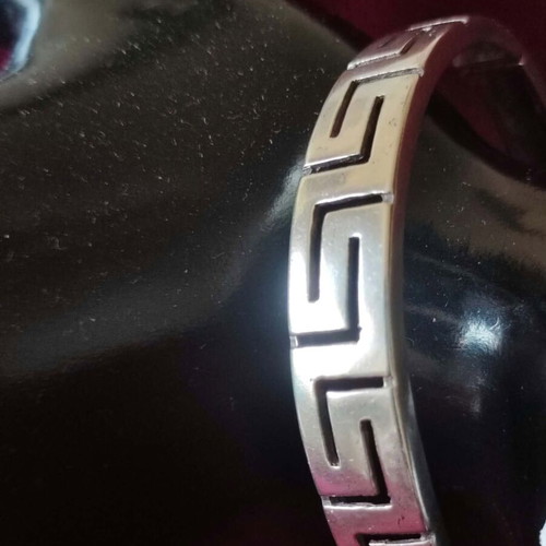 Silver 925 bracelet and ring set like new with meander design