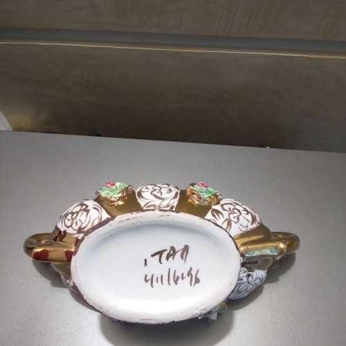 Porcelain vase in gondola shape like new, Italian style