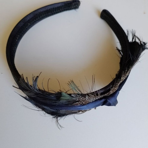Blue women's headband with feathers used