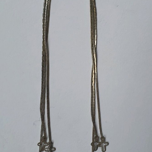 Long dangling earrings with small crosses