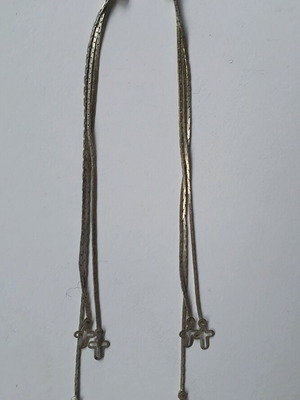 Long dangling earrings with small crosses