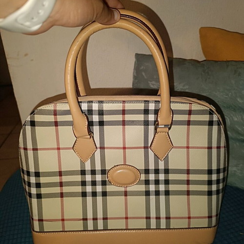 Handheld bag checkered in very good condition