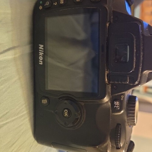 Nikon DSLR model D60 camera used with Nikon Aspherical lens