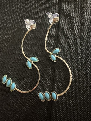 Long silver earrings with turquoise leaf stones