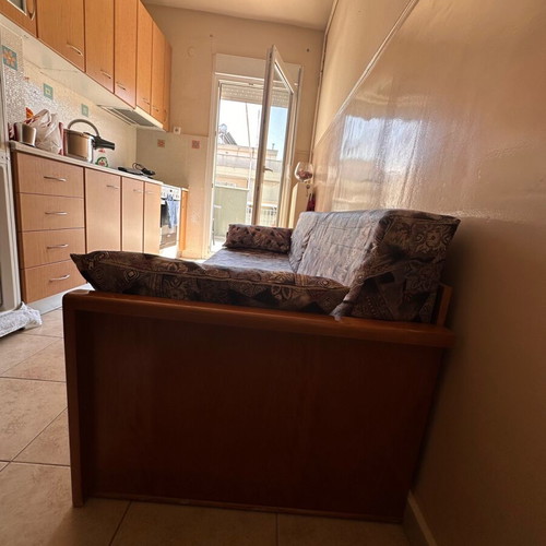 Three-seater sofa with storage space like new